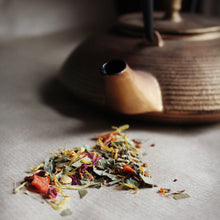 Load image into Gallery viewer, Chakra herbal loose leaf tea with gold teapot