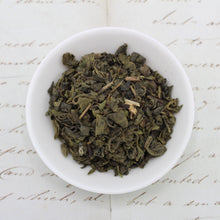 Load image into Gallery viewer, View from above of green tea with mint