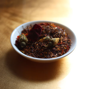spicy chilli rooibos tea on gold backdrop