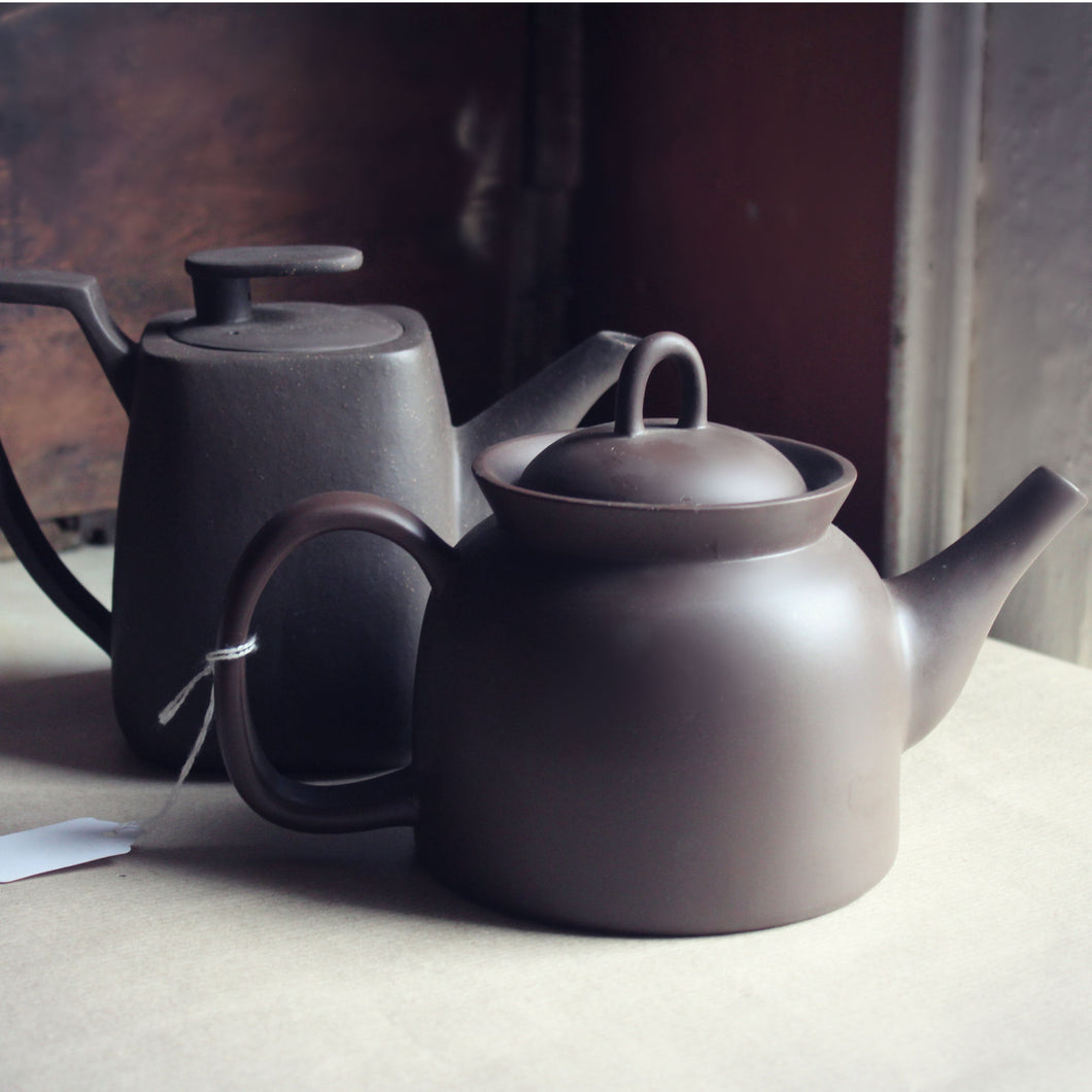 two Yixing teapots
