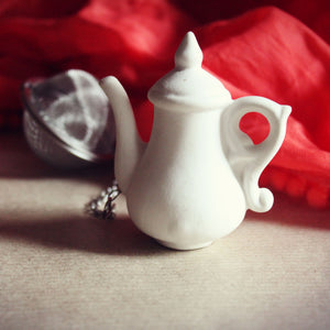 White teapot tea infuser